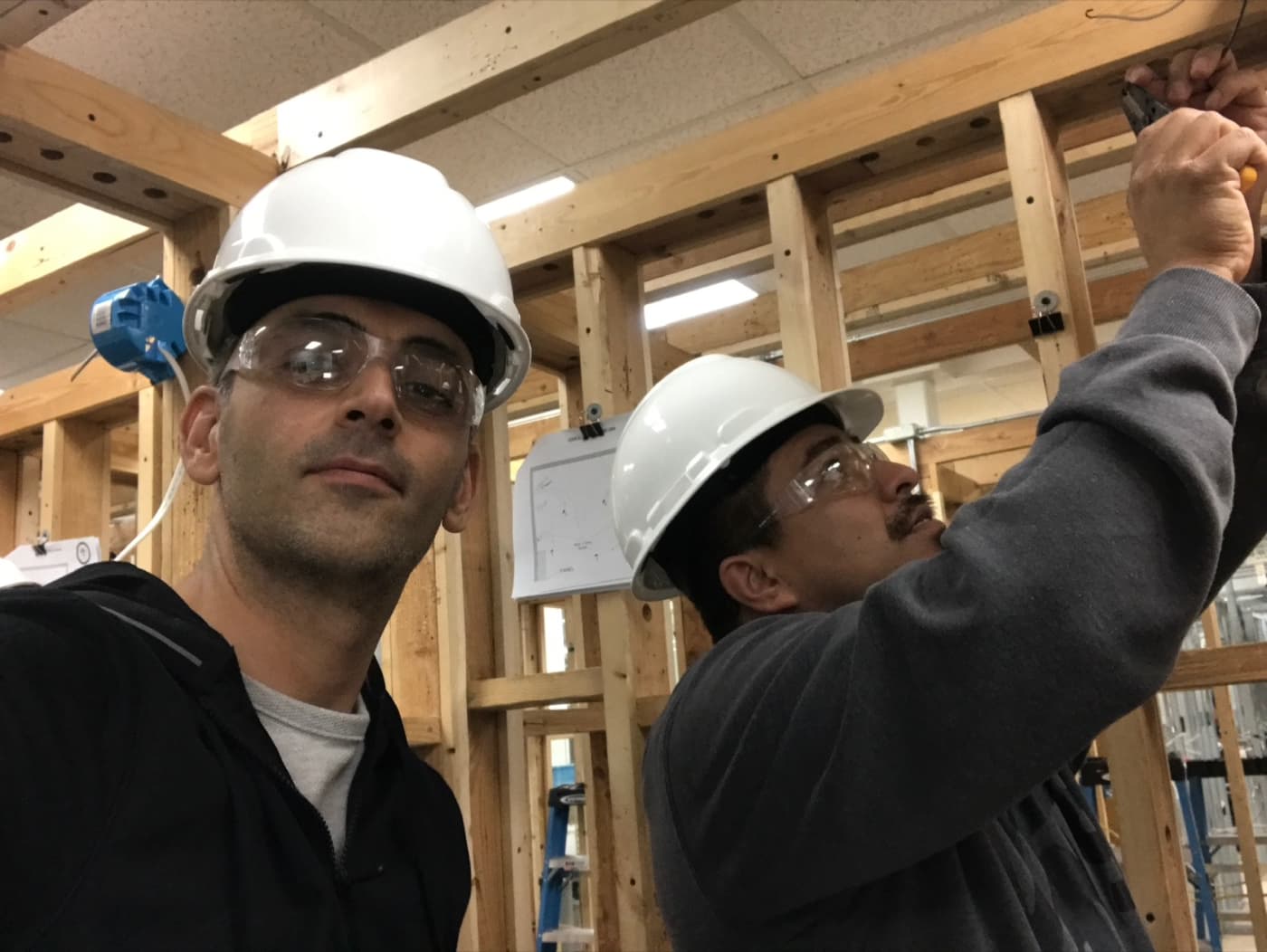Arya Electric team at work - professional electricians on site