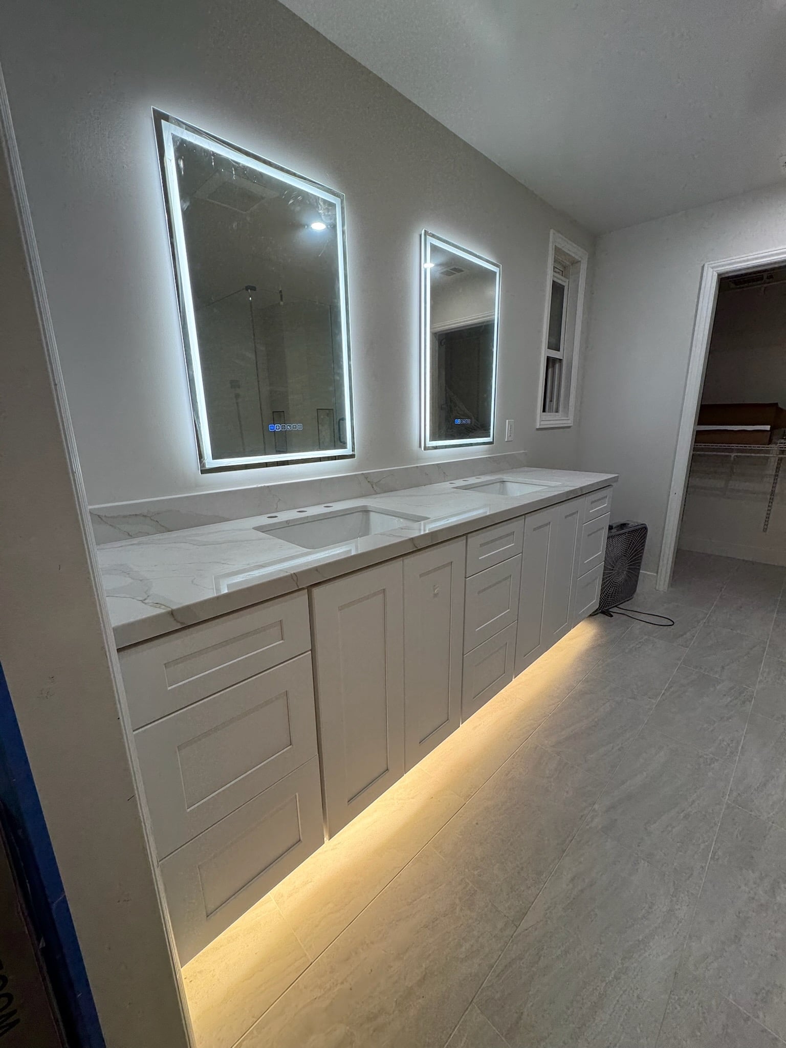 After lighting installation - professional bathroom and under cabinet LED lighting installed